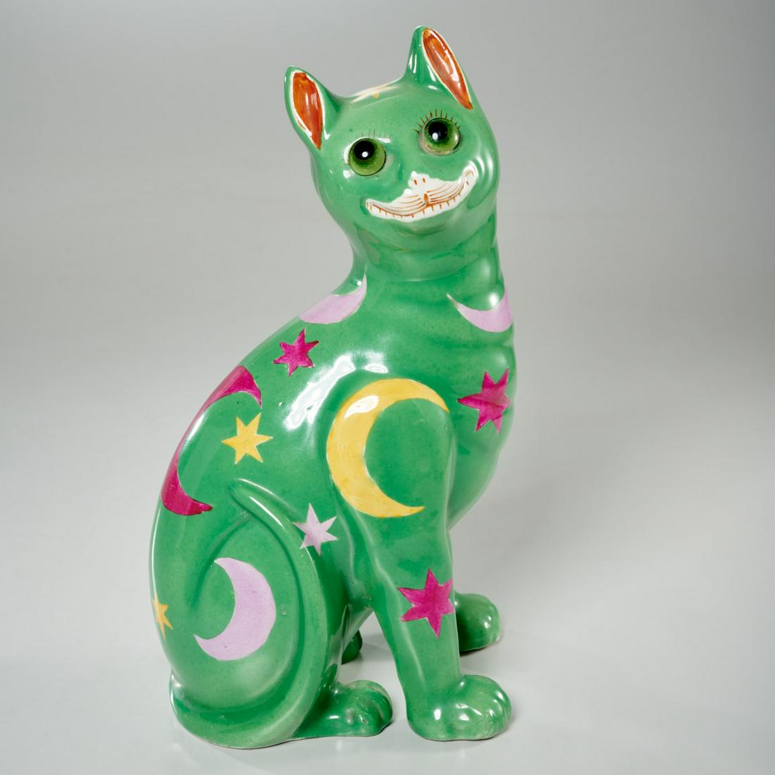 Emile Galle (after), glazed ceramic cat: Emile Galle (after), glazed ceramic cat, 20th c., green glazed ceramic cat with moon and star design, with glass eyes, after Emile Galle, unsigned, 13.5"h x 7.5"w x 5.5"d