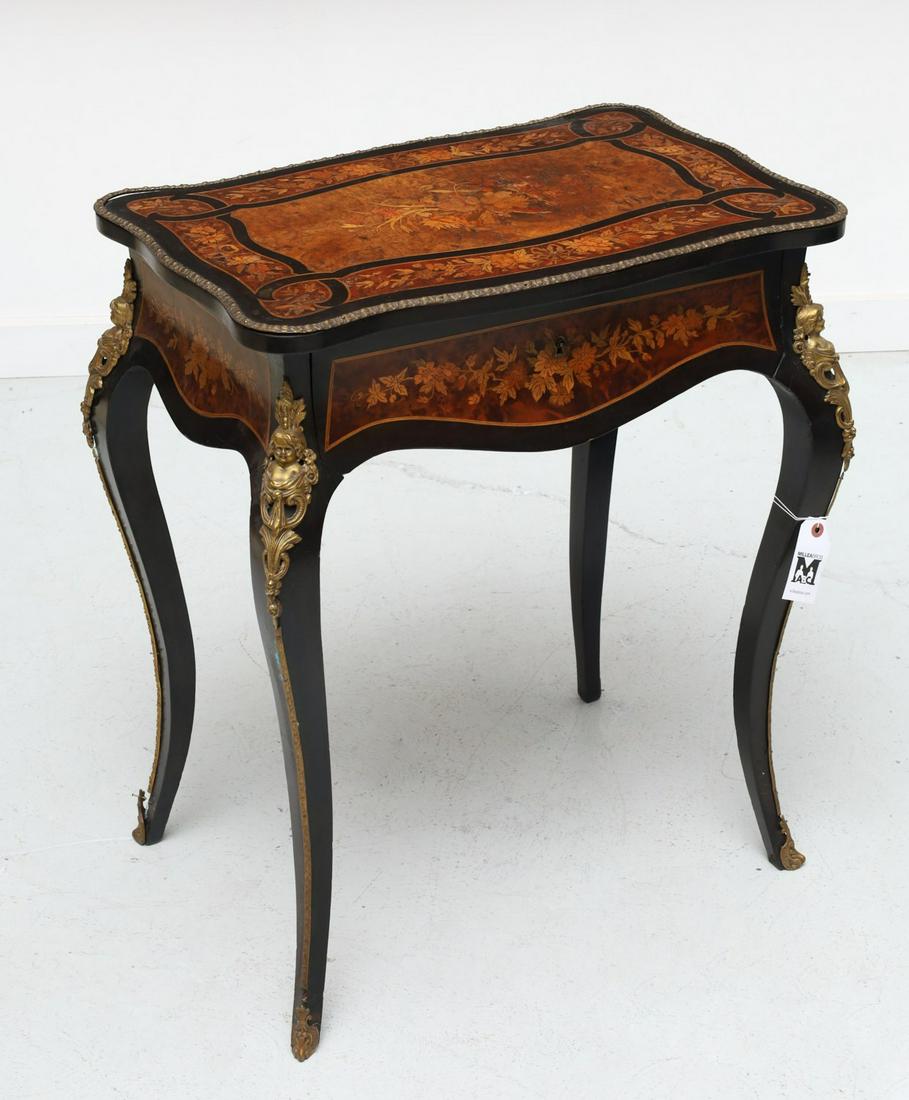 Napoleon III marquetry vanity or work table: Napoleon III marquetry vanity or work table, 19th c., the hinged top opening to mirrored interior with pull out drawer and compartments, on cabriole legs with gilt metal figural mounts, unmarked, 28.5