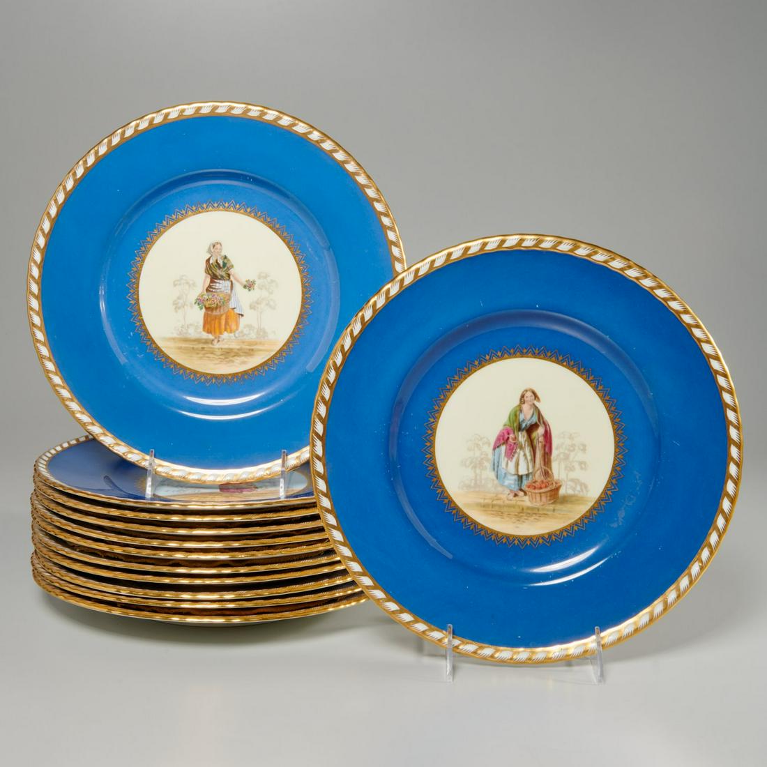 Set (12) Mintons figural cabinet plates: Set (12) Mintons figural cabinet plates, 20th c., porcelain cabinet plates, with artist embellished transfer decorated central medallions of various female street vendors, blue banded border, and gilt