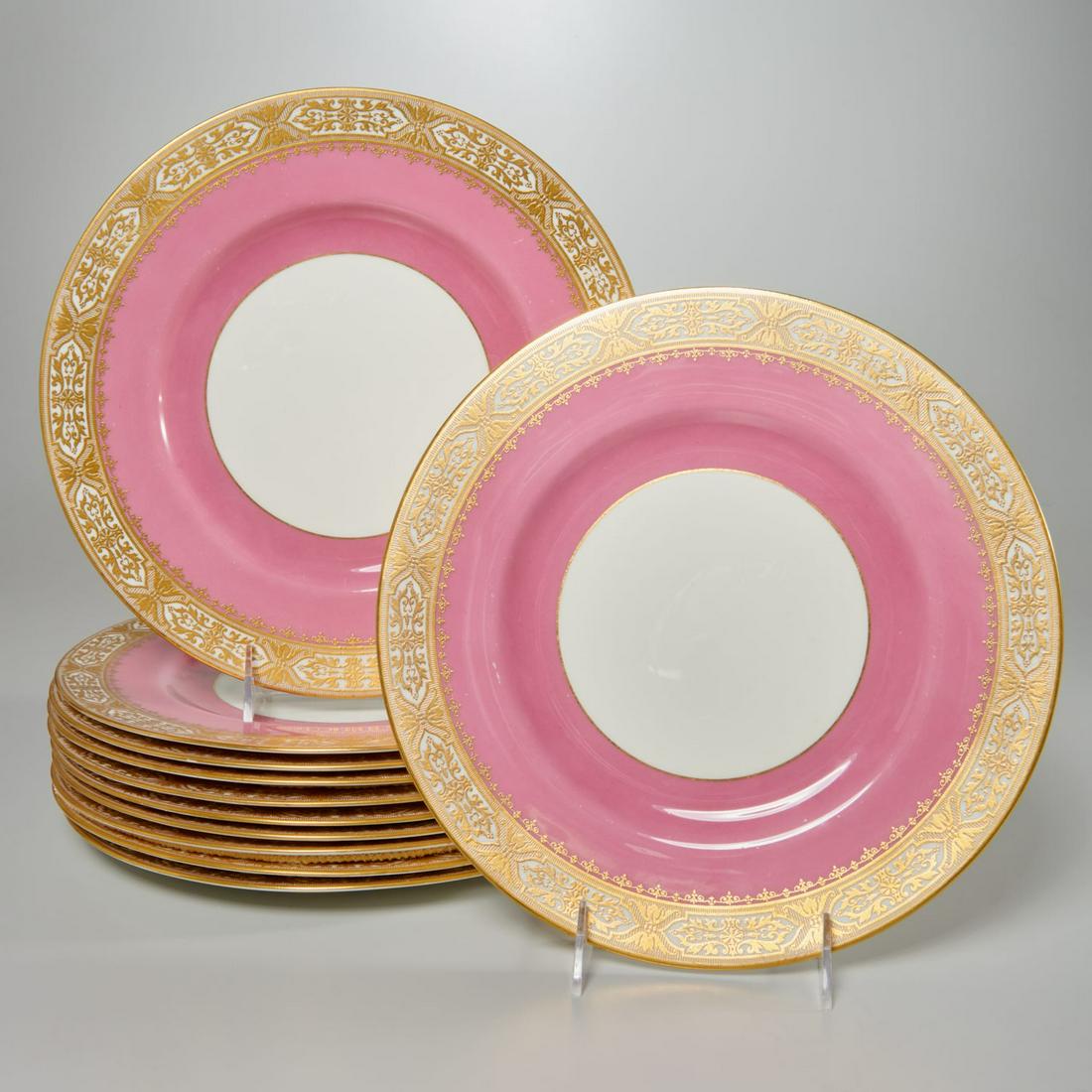 Set (13) Royal Worcester parcel gilt dinner plates: Set (13) Royal Worcester parcel gilt dinner plates, c. 1923, English, porcelain dinner or cabinet plates, with pink banded border, and gilt decorated edge, "Royal Worcester" maker's mark to underside,