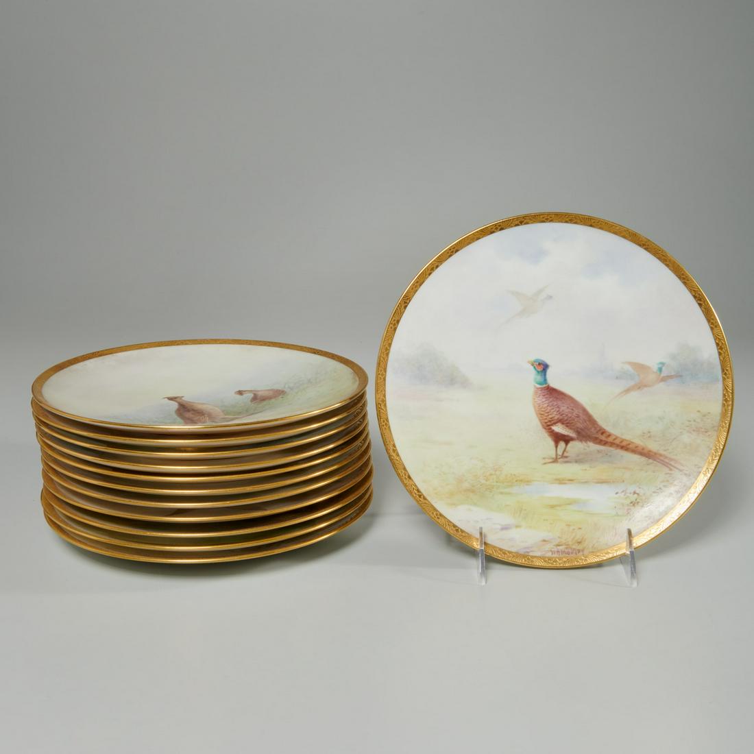 Set (12) Lenox hand-painted bird plates: Set (12) Lenox hand-painted bird plates, Early 20th c., American, porcelain plates, hand-painted in various bird designs, with gilt banding to edge, "Lenox" green maker's mark to underside, with "Gilm