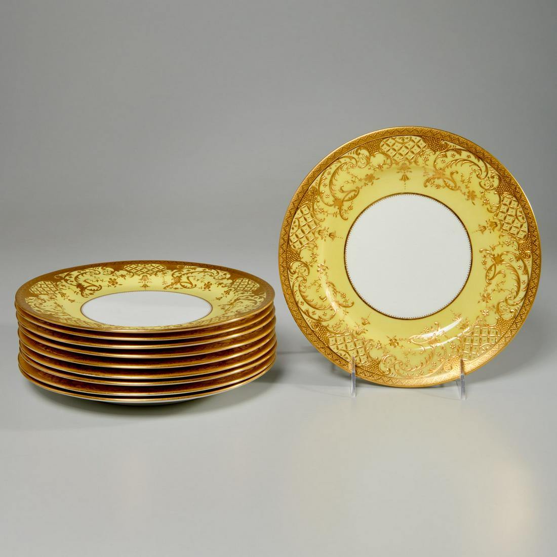 Set (10) Mintons parcel gilt salad plates: Set (10) Mintons parcel gilt salad plates, Late 19th/Early 20th c., English, porcelain salad plates, with yellow banded border, with slightly raised floral and scroll gilt decoration, and gilt banded 