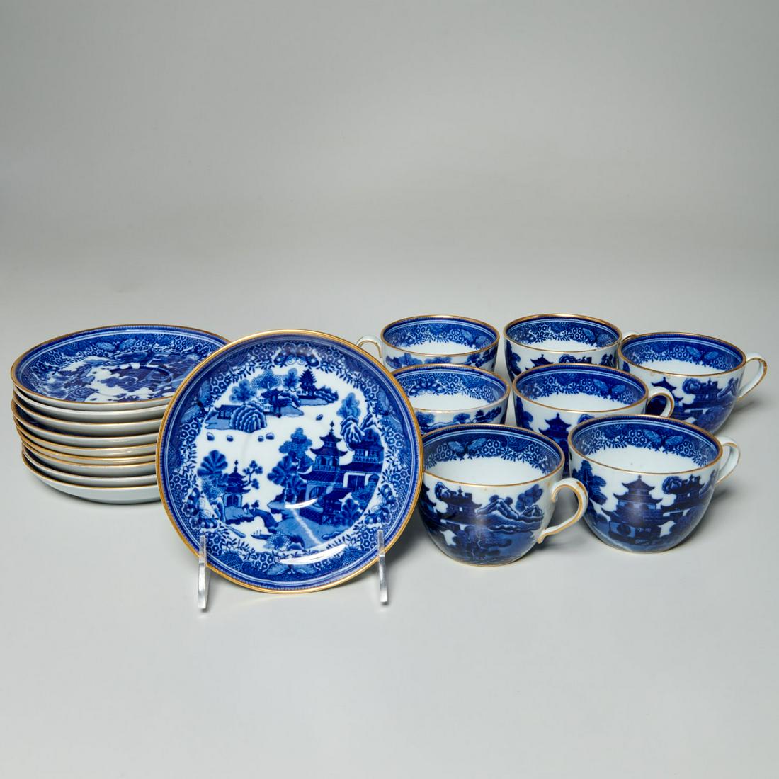 Set Spode for Tiffany teacups & saucers: Set Spode for Tiffany teacups & saucers, 20th c., English, incl. (10) porcelain saucers and (7) teacups, blue transfer decoration in the Asian style, with gilt edge, "Spode Copeland" maker's mark to u