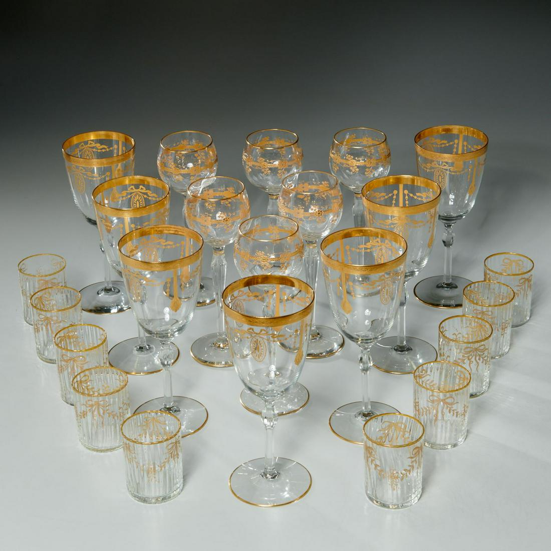 Group elegant gilt stemware and tumblers: Group elegant gilt stemware and tumblers, 19th/20th c., incl. a set of (7) goblets with gilt banded rim, ribbon and swag decoration and knopped stem, a set of (6) hoch wines with gilt floral band deco