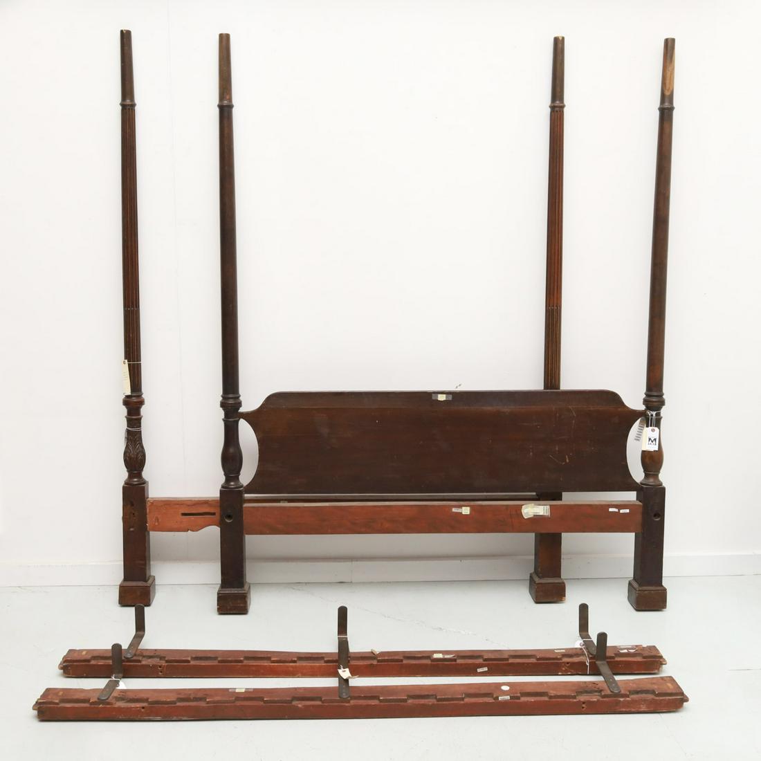 Federal carved mahogany four-post bed: Federal carved mahogany four-post bed, 19th c. or earlier, possibly mismatched footboard with fluted posts and smooth headboard with two older looking side rails, 80.5"h to top of posts, 63.5"w (head