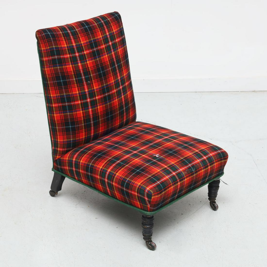 Victorian tartan upholstered slipper chair: Victorian tartan upholstered slipper chair, Late 19th c., turned ebonized wood legs with casters, 29.5"h x 19"w x 24"d Provenance: Property from a Private Jeffreys Lane, East Hampton Collection