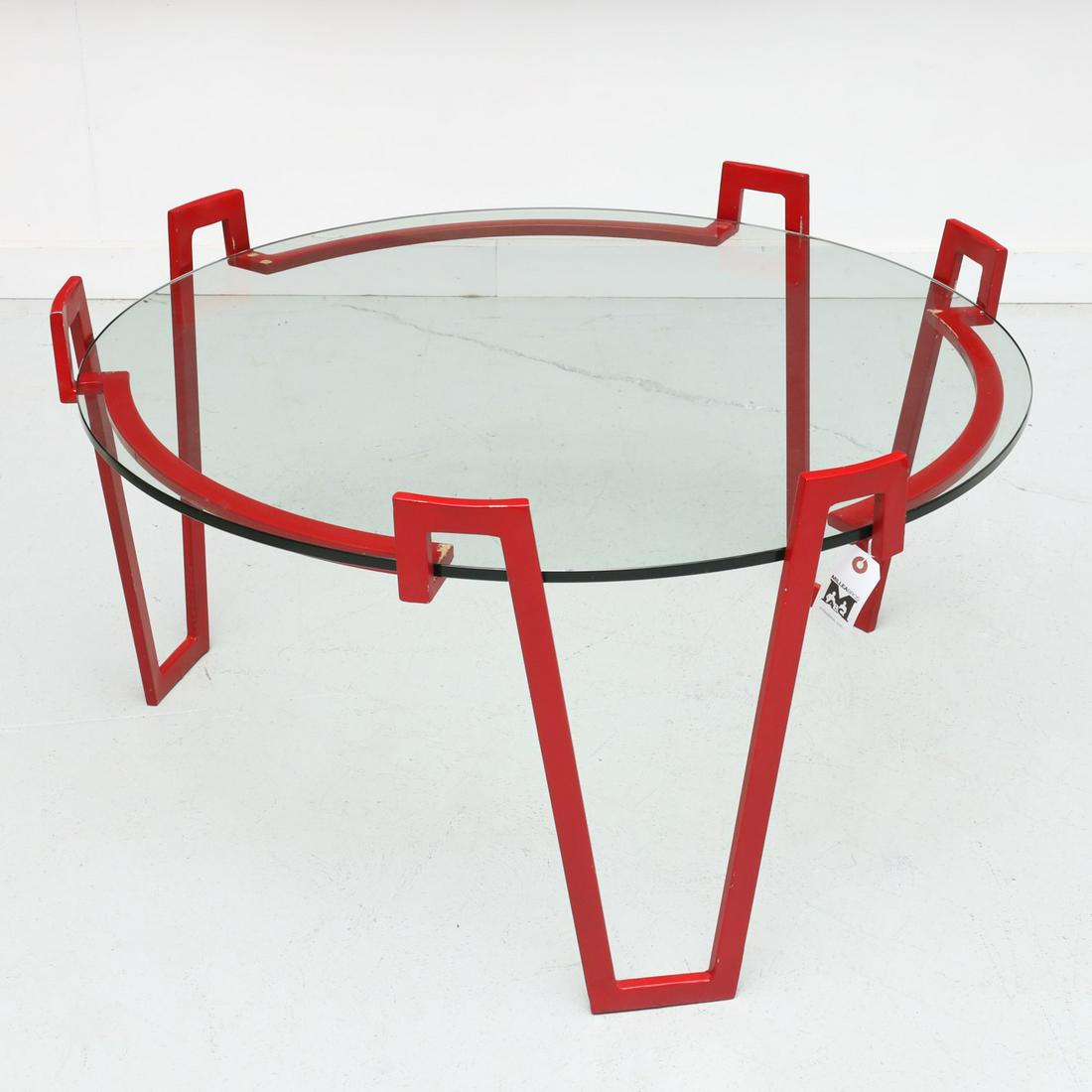 Jean Royere (after), Val D'or style coffee table: Jean Royere (after), Val D'or style coffee table, 20th c., red enameled metal base with round glass top, unmarked, 21"h x 37"dia.