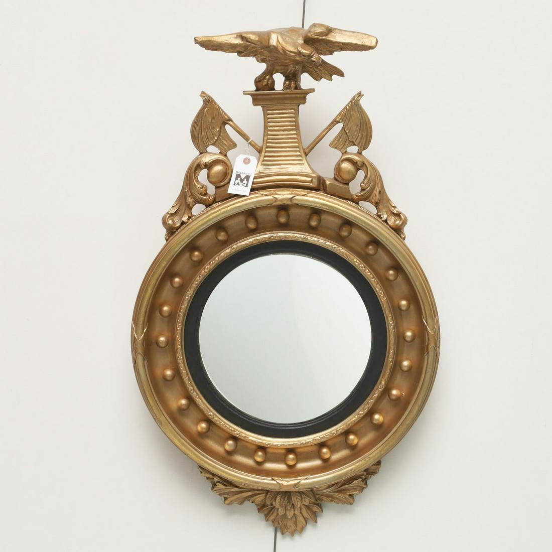 Henredon Natchez giltwood bullseye mirror: Henredon Natchez giltwood bullseye mirror, 20th c., Federal style giltwood mirror, with eagle crest, from the "Historic Natchez Collection", 40"h x 23"w