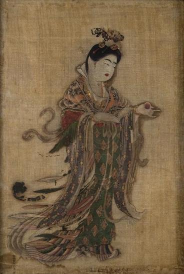 Early Japanese painting on silk: Early Japanese painting on silk, Possibly Edo Period, depicting Guanyin holding a red pearl, signed at lower left, 19.5" x 13" (sight), framed under glass