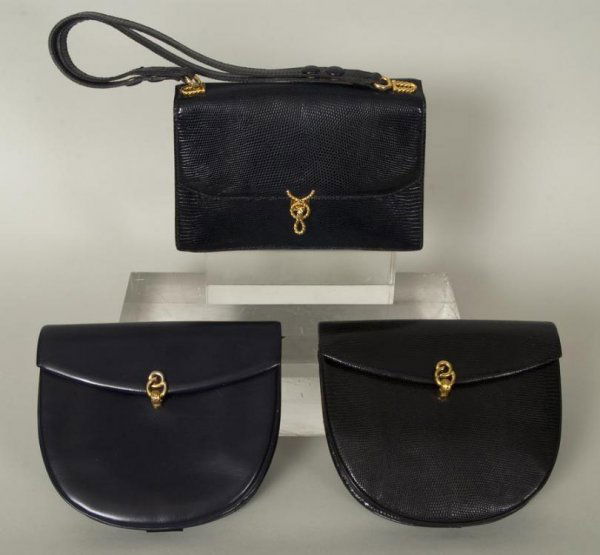 (3) Morabito, Paris handbags: (3) Morabito, Paris handbags, Circa 1980s, including: (2) clutch bags, one navy, the other black; together with (1) navy lizard bag with adjustable straps, Clutch bags: 7"h x 7.5"w x 1.5"d; Lizard bag