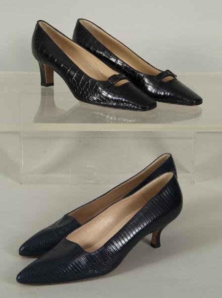 (2) pairs unworn Manolo Blahnik skin pumps: (2) pairs unworn Manolo Blahnik skin pumps, Circa 1990s, including: (1) pair black alligator pumps, size 38.5, and (1) pair navy blue lizard skin pumps, size 39 Provenance: The Estate of Lucia Moreira