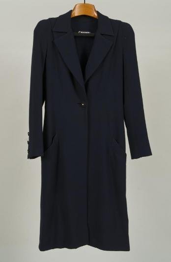 Chanel Couture coat and trousers: Chanel Couture coat and trousers, Circa 1980s, navy blue wool crepe single button coat, lined in navy silk, with matching pants, coat: 14"sh x 25"sl x 40"b x 42"l, pants: 28"w x 30"i, Provenance: The 