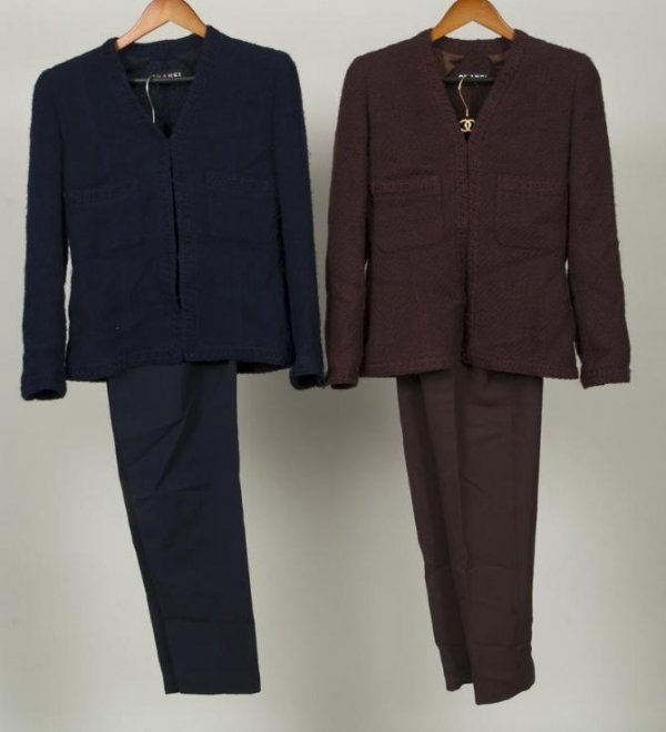 (2) Chanel Couture trouser suits: (2) Chanel Couture trouser suits, Circa 1970s, (2) identical suits, one navy, the other brown, nubby wool jacket with braid trim, with wool pants, navy suit: 15"sh x 23"sl x 38"b x 24.5"l (jacket), 26