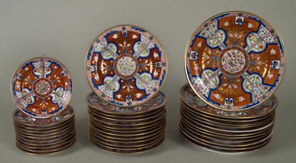 Antique Spode "Dollar" pattern part dinner service: Antique Spode "Dollar" pattern part dinner service, Second quarter 19th century, (36) pieces, comprising: (12) dinner plates; (13) salad/dessert plates; and (11) bread plates, decorated in the Asian t