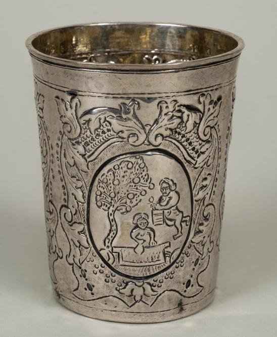 Antique Russian chased silver beaker by Semenov: Antique Russian chased silver beaker by Semenov, Moscow, circa 1744, maker's mark of Peter Semenov, chased with scrolling foliage, dog and parrot, 3.25"h x 2.75"dia., approx. 2.5 ozt.