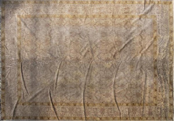 Antique Agra style carpet: Antique Agra style carpet, 20th century, the cream field with all-over beige foliate design within yellow border stripes, approx. 15' x 12'