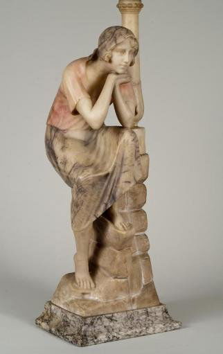 Antique Italian stained alabaster figural lamp: Antique Italian stained alabaster figural lamp, Early 20th century, modeled as a peasant girl sitting on a rockwork wall, unsigned, 26"h x 9.5"w x 6.75"d(excluding lamp fittings), 37"h(total)