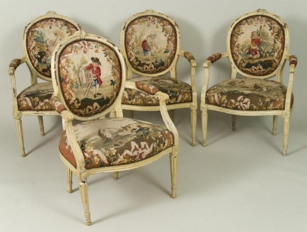 Set (4) Louis XVI style cream painted fauteuils wi: Set (4) Louis XVI style cream painted fauteuils with aubusson upholstery, 19th Century, each oval-shaped backrest and serpentine seat covered in antique aubusson tapestry on round, tapering stop-flute