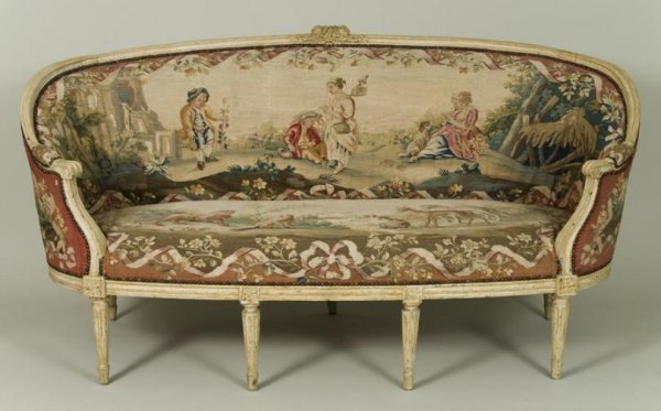 Louis XVI style cream painted canape with aubusson: Louis XVI style cream painted canape with aubusson upholstery, 19th Century, the molded frame with ribbon and blossom crest over a curving backrest and seat covered in antique aubusson tapestry on rou