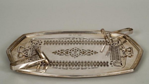 Rare American sterling silver asparagus tray and t: Rare American sterling silver asparagus tray and tongs, 20th century, the rectangular tray with pierced liner by International, the tongs of English make, maker's marks "GJ-DF", tray: 12.5"l x 8.5"w, 