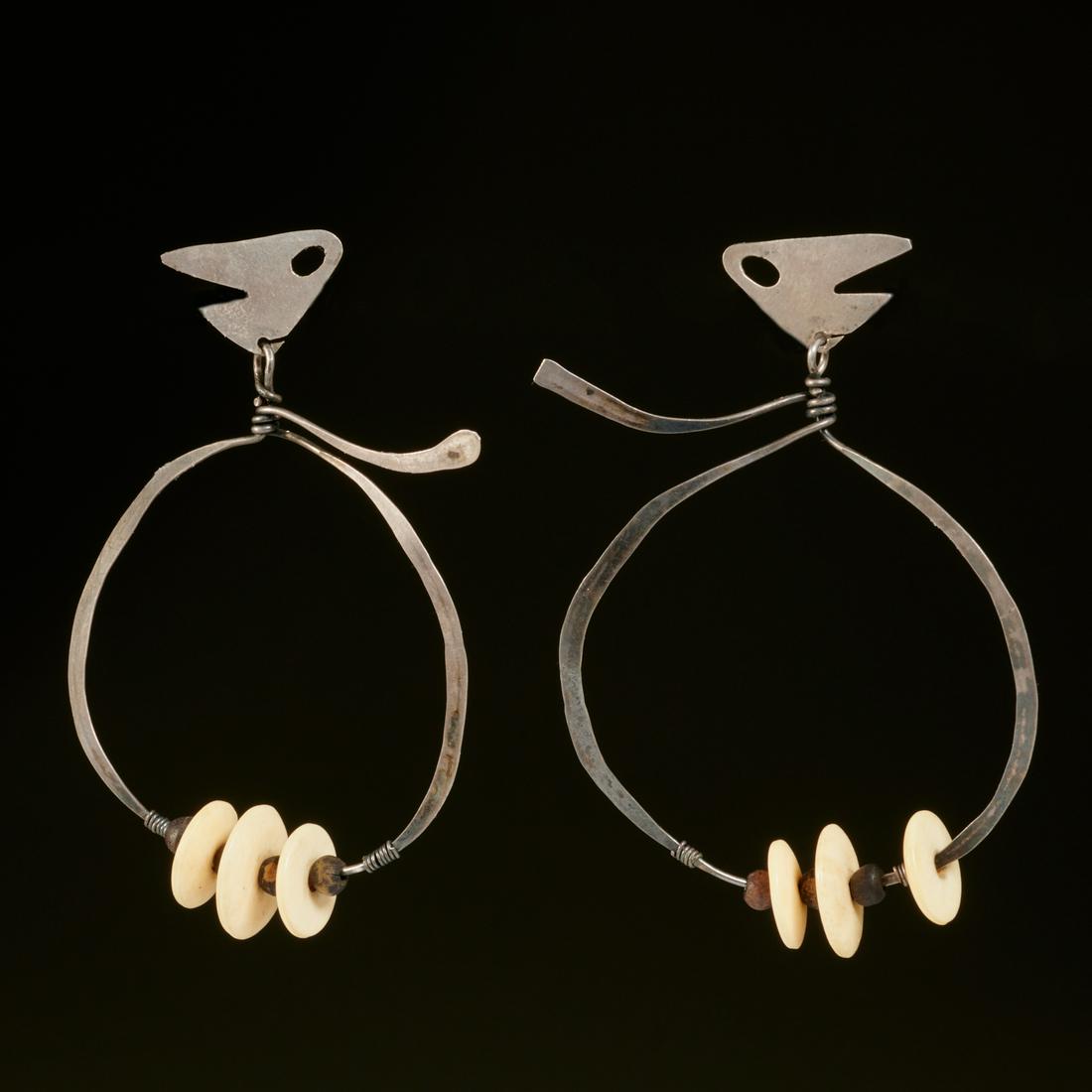 Ed Wiener, pair sterling earrings: Ed Wiener, pair sterling earrings, Ed Wiener (American, 1918-1991), pair free form hand wrought silver earrings with bead details, stamped signature and marked "Sterling" verso, 3.25"h x 2.25"w Proven