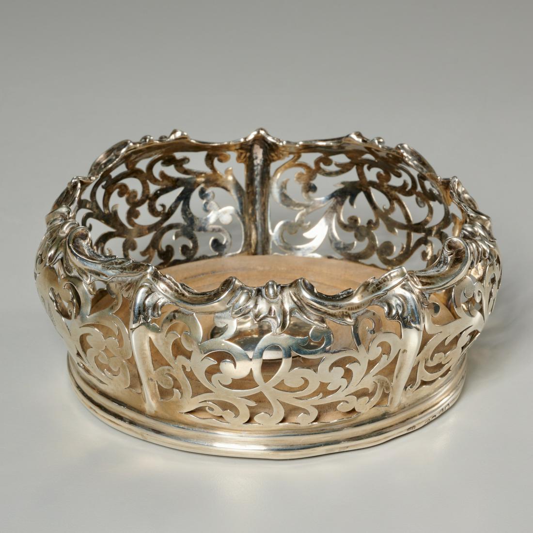 Charles Thomas Fox English sterling wine coaster: Charles Thomas Fox English sterling wine coaster, Mid 19th c., London, reticulated scroll design, with engraved eagle on central cartouche, wooden base, hallmarked with "CTF" maker's mark along base o