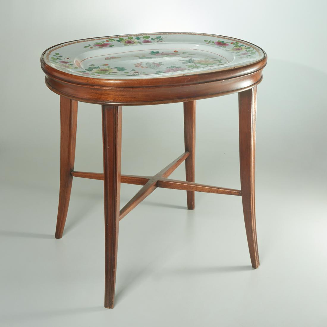 English ironstone tray on table base: English ironstone tray on table base, 19th c. on later base, Chinese garden decoration on mahogany table stand with slightly splayed legs and x-form stretcher, unmarked, 20.5"h x 20.5"w x 16"d