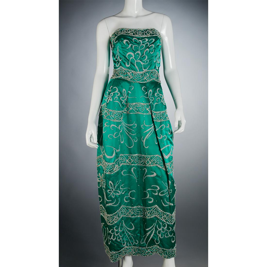 Zou Nan Hong Kong embellished evening gown: Zou Nan Hong Kong embellished evening gown, 1950's/1960's, heavily beaded teal satin strapless maxi dress with scalloped hemline, front pleating, zipper back, approx. 32"b, 24"w, 53"l (from shoulder)