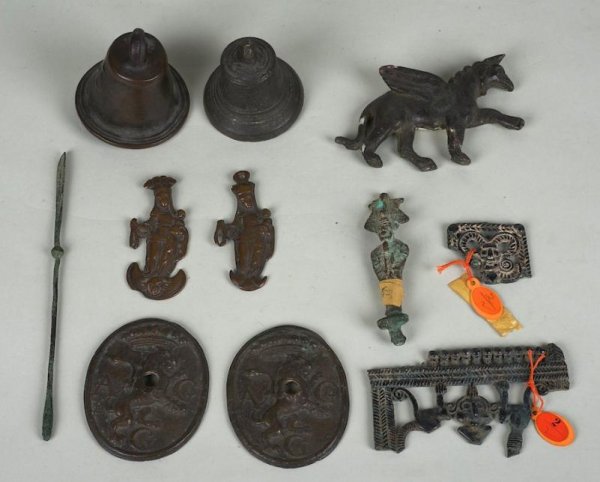 Roman, Luristani, Egyptian and European bronze art: Roman, Luristani, Egyptian and European bronze artifacts, Probably 200-300 AD and later, largest: 4.25"l x 2.5"w, smallest: 1.75"h x 1.5"w Provenance: The Neil Phillips Collection