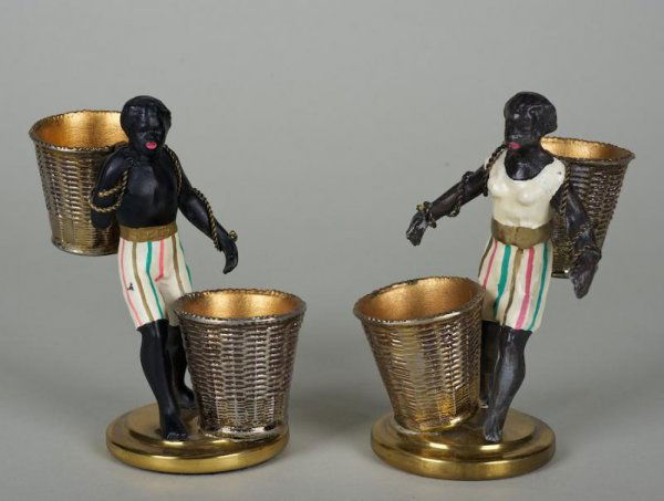 Pair painted metal blackamoor table accessories: Pair painted metal blackamoor table accessories, 20th century, 5"h