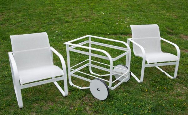 Group Brown Jordan Quantum outdoor furniture: Group Brown Jordan Quantum outdoor furniture, Circa 2007, incl. (2) armchairs and (1) serving cart, cart: 27"h x 32"l Provenance: The Estate of Gerald Tsai, NY