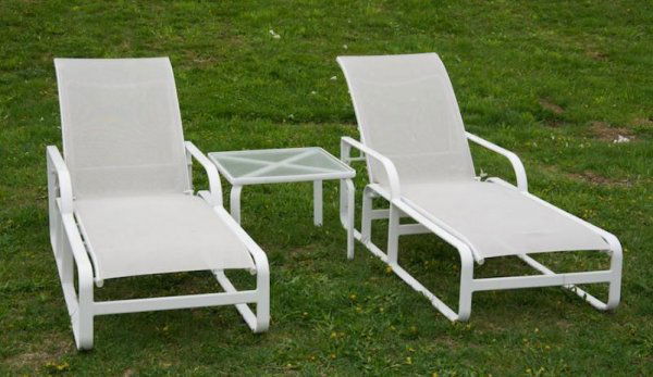 Group Brown Jordan Quantum outdoor furniture: Group Brown Jordan Quantum outdoor furniture, Circa 2007, incl. (2) chaises and (1) occasional table, chaises: 78"l Provenance: The Estate of Gerald Tsai, NY