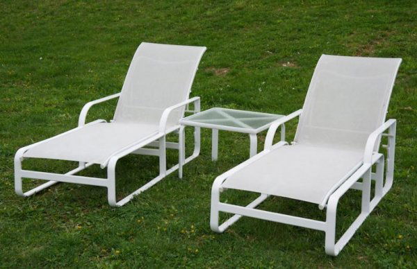 Group Brown Jordan Quantum outdoor furniture: Group Brown Jordan Quantum outdoor furniture, Circa 2007, incl. (2) chaises and (1) occasional table, chaises: 78"l Provenance: The Estate of Gerald Tsai, NY