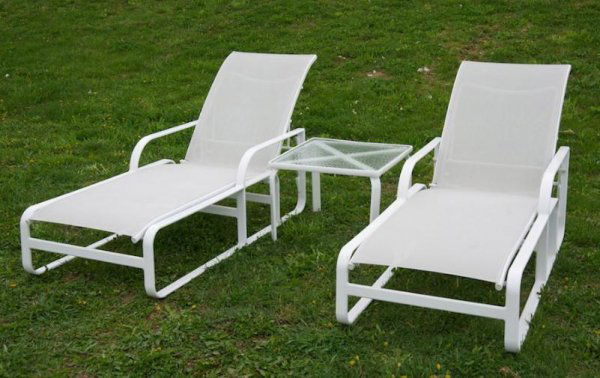 Group Brown Jordan Quantum outdoor furniture: Group Brown Jordan Quantum outdoor furniture, Circa 2007, incl. (2) chaises and (1) occasional table, chaises: 78"l Provenance: The Estate of Gerald Tsai, NY