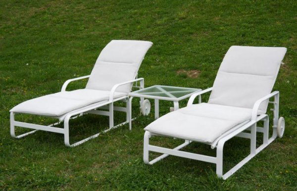 Group Brown Jordan Quantum outdoor furniture: Group Brown Jordan Quantum outdoor furniture, Circa 2007, incl. (2) wheeled chaises and (1) occasional table, chaises: 78"l Provenance: The Estate of Gerald Tsai, NY