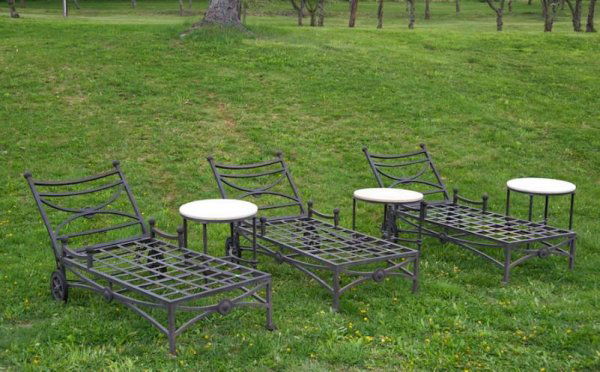 Group designer aluminum outdoor furniture: Group designer aluminum outdoor furniture, Circa 2000, incl. (3) chaises and (3) marble top occasional tables, chaises: 82"l, tables: 22"dia. Provenance: The T. Constantiner Collection, Los Angeles, C