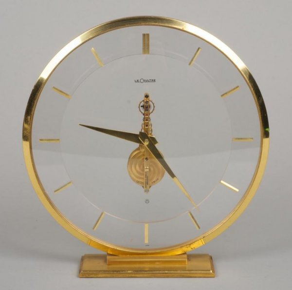 Mid-Century LeCoultre brass and acrylic table clo: Mid-Century LeCoultre brass and acrylic table clock, 20th century, 16 jewels, 7.5"h x 7"dia.