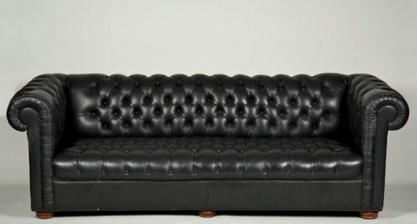 Black button-tufted leather Chesterfield sofa: Black button-tufted leather Chesterfield sofa, Late 20th century, 28"h x 90"w x 34"d
