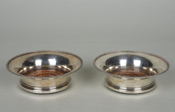 Pair Georgian style American silver wine coasters: Pair Georgian style American silver wine coasters, 20th century, 6"dia.