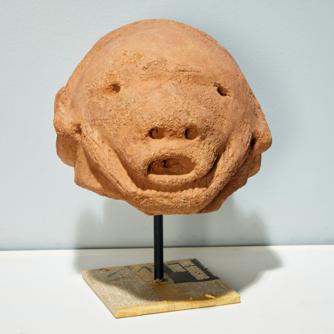 Katsina Culture, terracotta head: Katsina Culture, terracotta head, Possibly 200 BCE-100CE, modern Nigeria, on custom metal stand, 9"h x 10"dia (head) Provenance: Estate of Distinguished Professor Philip Gould, NYC Notes/Literature: P