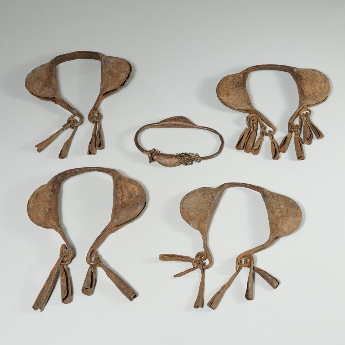 Yoruba Peoples, (5) currency gongs: Yoruba Peoples, (5) currency gongs, Nigeria, forged iron, 10"h x 7"w (largest), 5.75"h x 4.25"w (smallest) Provenance: Estate of Distinguished Professor Philip Gould, NYC Notes/Literature: Professor o