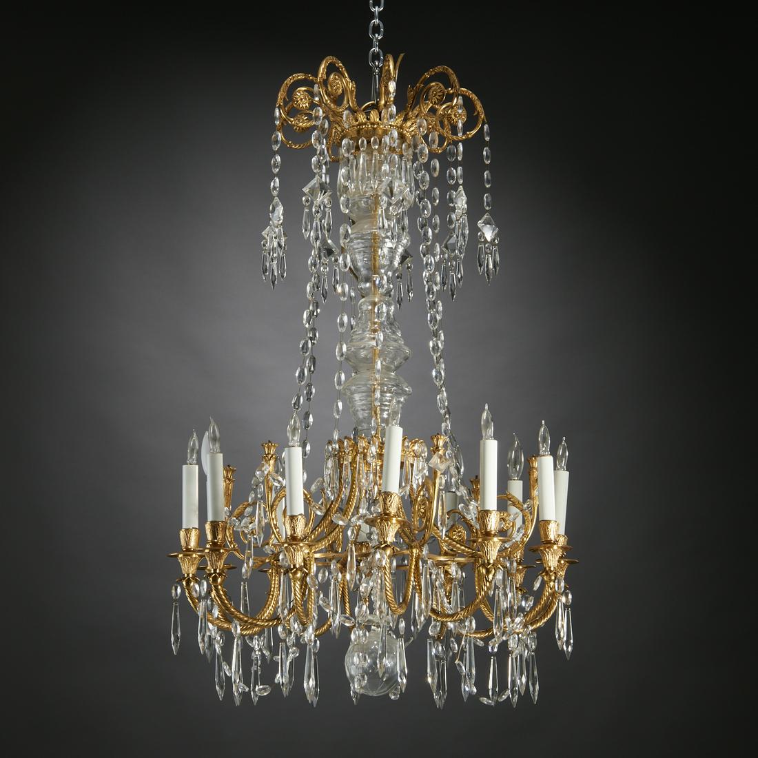 Nice Louis XVI style ormolu and crystal chandelier: Nice Louis XVI style ormolu and crystal chandelier, 19th/20th c., France, 12-lights, tiered metal armature strung with cut crystal beads and drops, the lower tier issuing scrolling rope-twist arms end