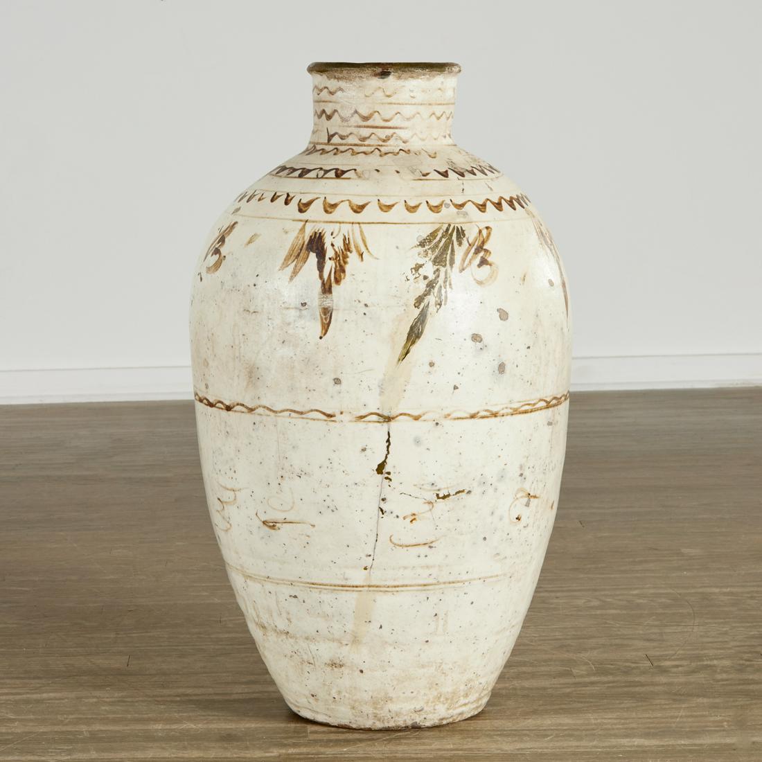 Large Chinese Ming Cizhou wine storage vessel: Large Chinese Ming Cizhou wine storage vessel, Ming Dynasty (16th c.), slip decorated camel glazed pottery, 30"h x 15"dia Provenance: A Private Collection: 151 East 58th Street, NY
