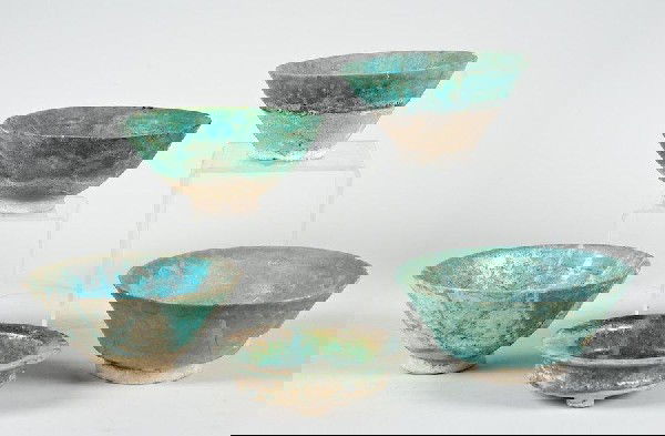 (5) Islamic turquoise glazed earthenware bowls: (5) Islamic turquoise glazed earthenware bowls, Possibly 14th c., 3.25"h x 7.5"dia. (largest), 1.75"h x 6"dia. (smallest)