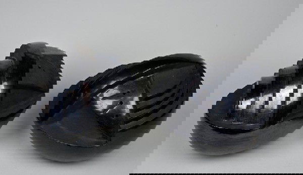 Miguel Angel Rios (b. 1943, Argentine), (2) sculp: Miguel Angel Rios (b. 1943, Argentine), (2) sculptures, Untitled geometric forms, black pottery, signed and dated '87, ed. no. 1/5, 11"h x 13"l x 10"w Provenance: The T. Constantiner Collection, Los A