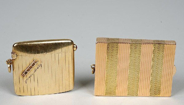 (2) 14K gold, ruby match safes incl. Charlton & C: (2) 14K gold, ruby match safes incl. Charlton & Co., Early 20th c., 2.25"l x 1.75"w (larger), 1.75" squ. (smaller), approx. 42.6 dwt. (total)