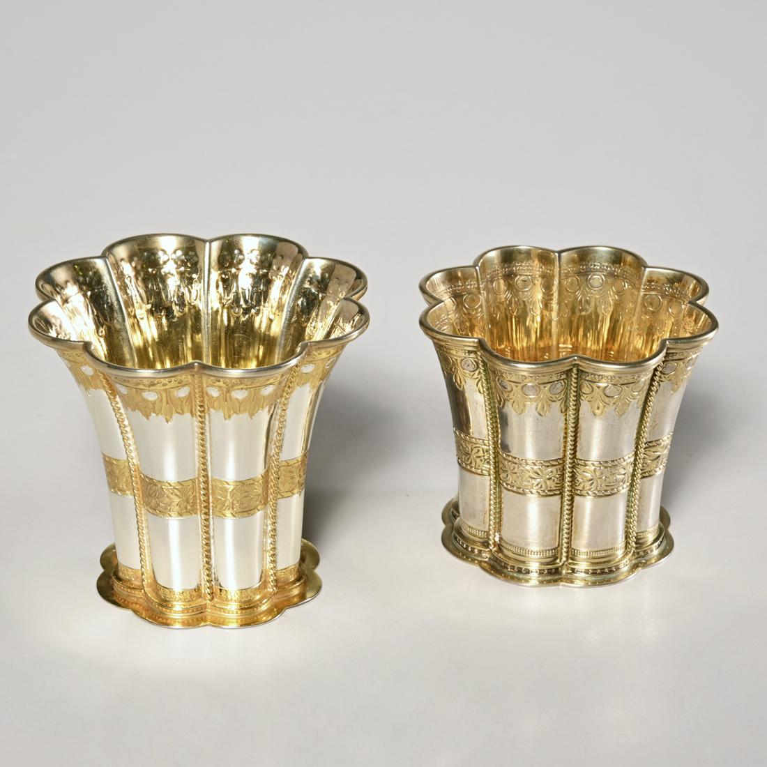 (2) Scandinavian gilt silver cups, incl Michelsen: (2) Scandinavian gilt silver cups, incl Michelsen, Designed mid-20th c., sterling, each with lobed flaring body and incised banding, including a vermeil banded example marked "SVP", Denmark", together