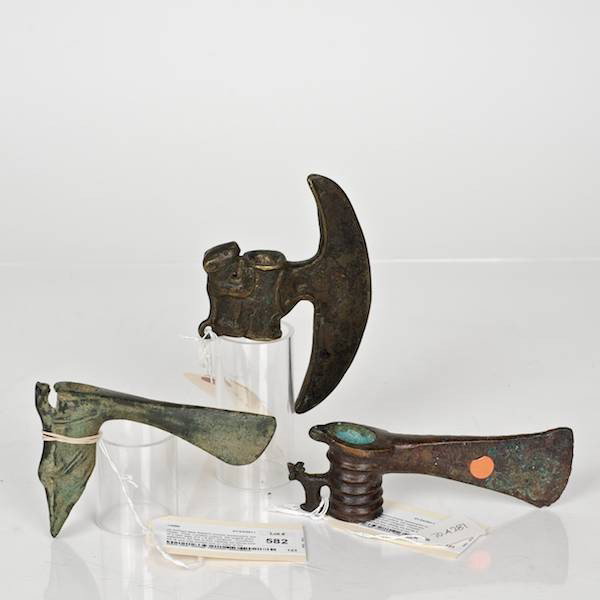 (3) Ancient Near Eastern bronze zoomorphic axe hea: (3) Ancient Near Eastern bronze zoomorphic axe heads, Prob. Luristan culture, the largest poss. of a later date, 4"h x 6.25"l (largest) Provenance: From an important and internationally renowned sing