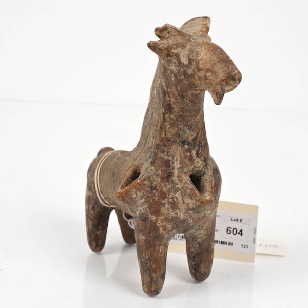 Ancient Near Eastern glazed pottery horse oil lamp: Ancient Near Eastern glazed pottery horse oil lamp, Brown glaze, 7"h x 5.5"l Provenance: From an important and internationally renowned single owner collection sold anonymously without reserve.