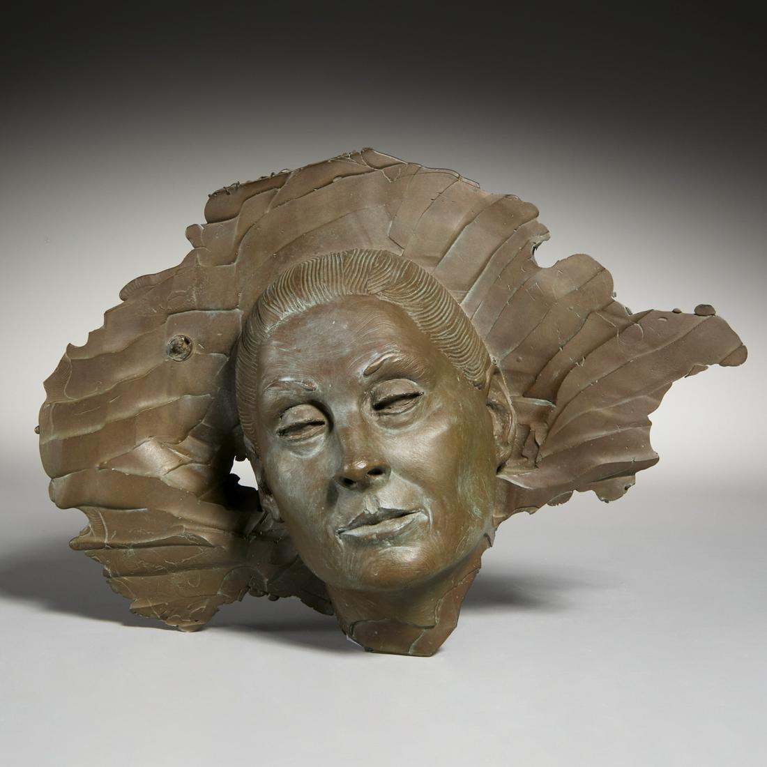 Robert Graham, bronze mask, Anjelica Huston: Robert Graham, bronze mask, Anjelica Huston, Robert Graham (American, 1938-2008) Untitled (Mask of Anjelica Huston), brown patinated cast bronze, no signature observed, possibly a unique work, 9"h x 1